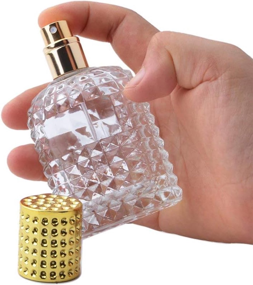 Goud - 50ml - Navulbare luxe parfumfles van helder goudglas - Parfumdispenser Sprayfles - Draagbare parfumdispenserfles - Gemakkelijk mee te nemen
